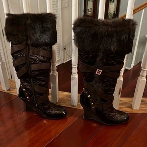 Barely worn, fashionable, brown Baby Phat boots! Size 9. Like New!